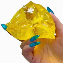 Jouet antistress squishy fromage translucide jaune en gelée avec texture souple miel à malaxer en forme de tranche de fromage