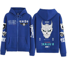 Sweat à capuche kaiju bleu avec dessin de crâne démoniaque blanc gris au dos et patches noirs blancs aux manches