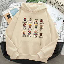 Sweatshirt à capuche earthbound crème avec design pixel art dragon quest et texte japonais sous les personnages