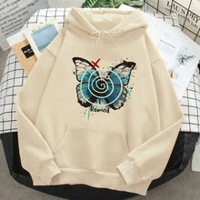 Sweatshirt à capuche beige life is strange avec papillon bleu noir, marque rouge x et texte rewind sous le motif