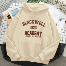 Beige sweatshirt à capuche life is strange avec impression blackwell academy 1910 arcadia bay oregon en lettres bordeaux