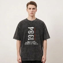 T-shirt coton noir distressed avec graphisme blanc 1984 et design inspiré george orwell style vintage