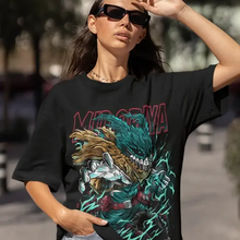 T-shirt académie de super-héros en coton noir oversize avec un graphisme vibrant de muzan kibutsuji en teal et or hero academia imprimé