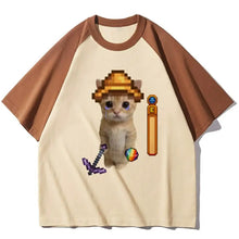 Cream-colored raglan t-shirt with brown sleeves featuring stardew valley pixel art cat design for t-shirt stardew valley fans