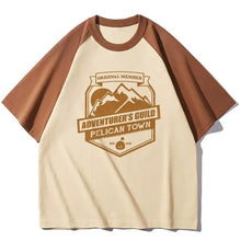 T-shirt stardew valley crème à manches raglan marron avec logo vintage original member adventurer’s guild pelican town