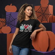 T-shirt coton love cat noir à manches courtes avec un graphisme coloré de signes de paix, cœurs et pattes de chat pailletées