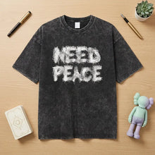 T-shirt coton need peace noir distressed avec graphique need peace blanc style spray texturé