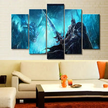 Tableau gaming scène en 5 pièces montrant un guerrier sombre avec épée lumineuse face à un dragon bleu sur paysage glacé