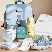 Light blue school backpack with black strap and silver buckle personalized with tampon prénom personnalisé katharine logo soccer ball