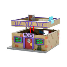Taverne cartoon en briques de construction beige et violet avec porte rouge et fenêtres vertes en plastique abs