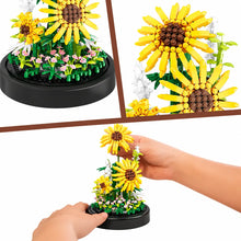 Bouquet de tournesol jaune vif en briques plastiques avec led à lumière chaude sous cloche transparente