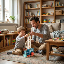 Train électrique poseur bleu et orange en plastique avec une tour pour poser des dominos rose 63 pièces