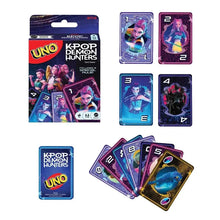 Cartes uno k-pop demon hunters avec cartes néon colorées illustrant des personnages et boîte thème violet