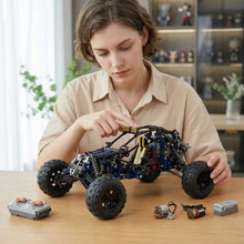 Voiture électrique télécommandée bleue et noire en briques plastiques assemblables pour tout-terrain